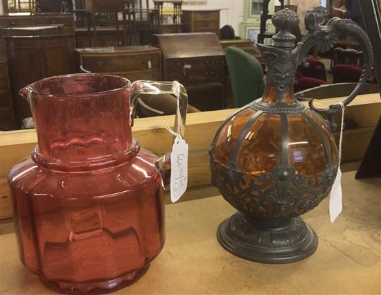 Continental pewter-mounted amber glass ewer & a Victorian cranberry glass jug